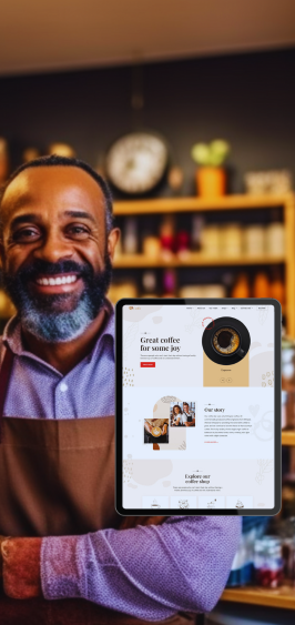 Coffee shop small business owner smiling at camera